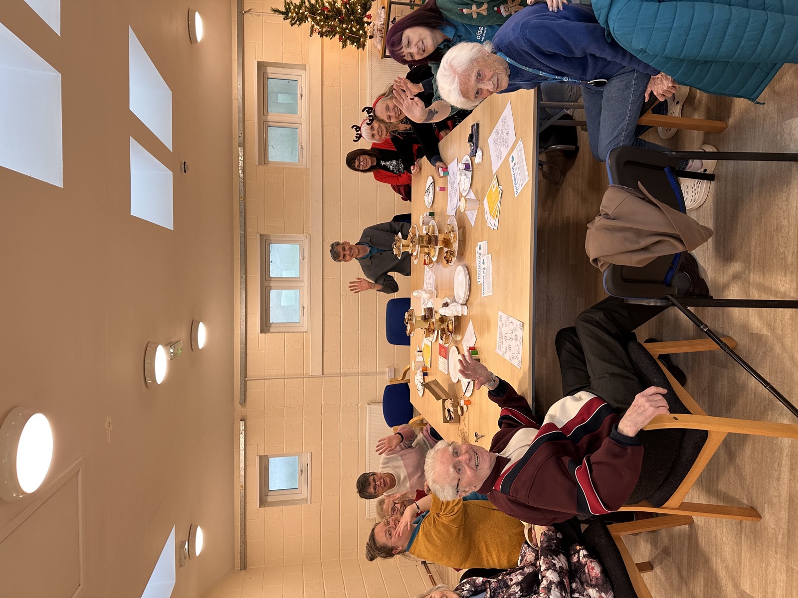 Clients, families and the Otter Homecare team together at a festive Otter Café afternoon