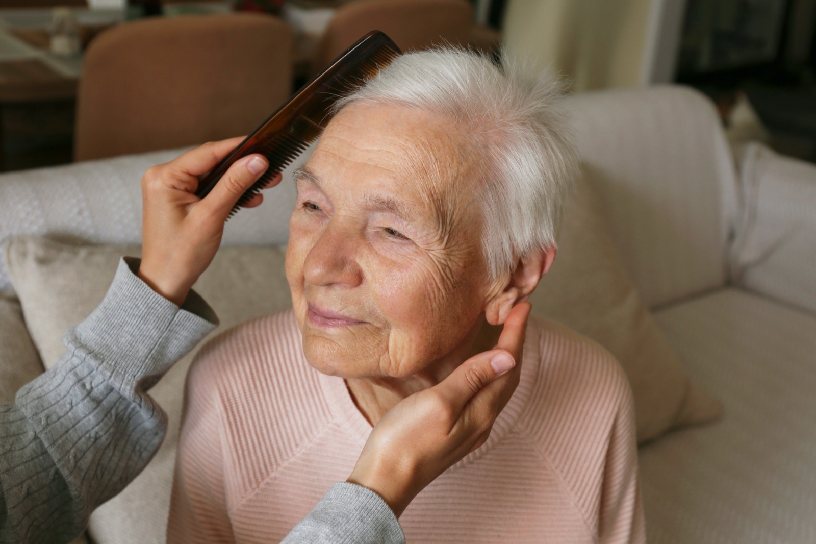 An Otter Care Professional supporting an older client at home
