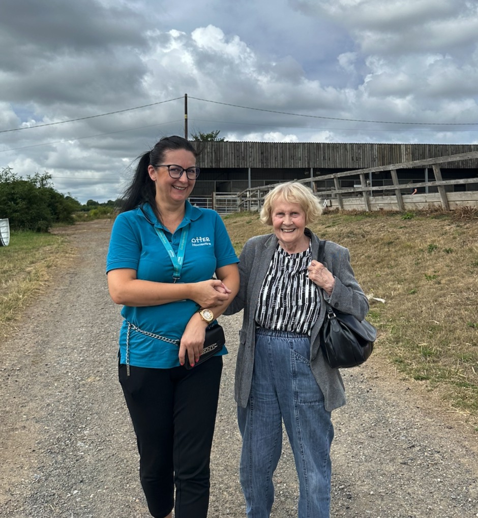 An Otter Care Professional out with a client in the community
