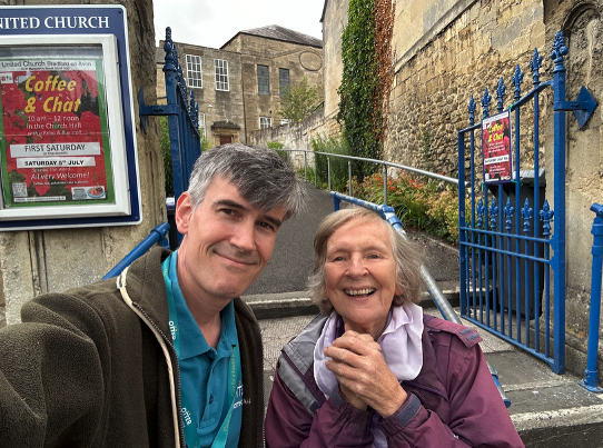 A client out at church on a Sunday with her Care Professional